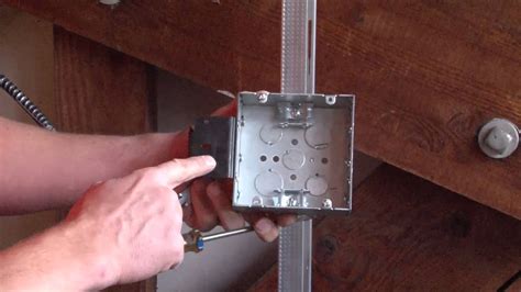 centering a junction box between studs|framing a stud between boxes.